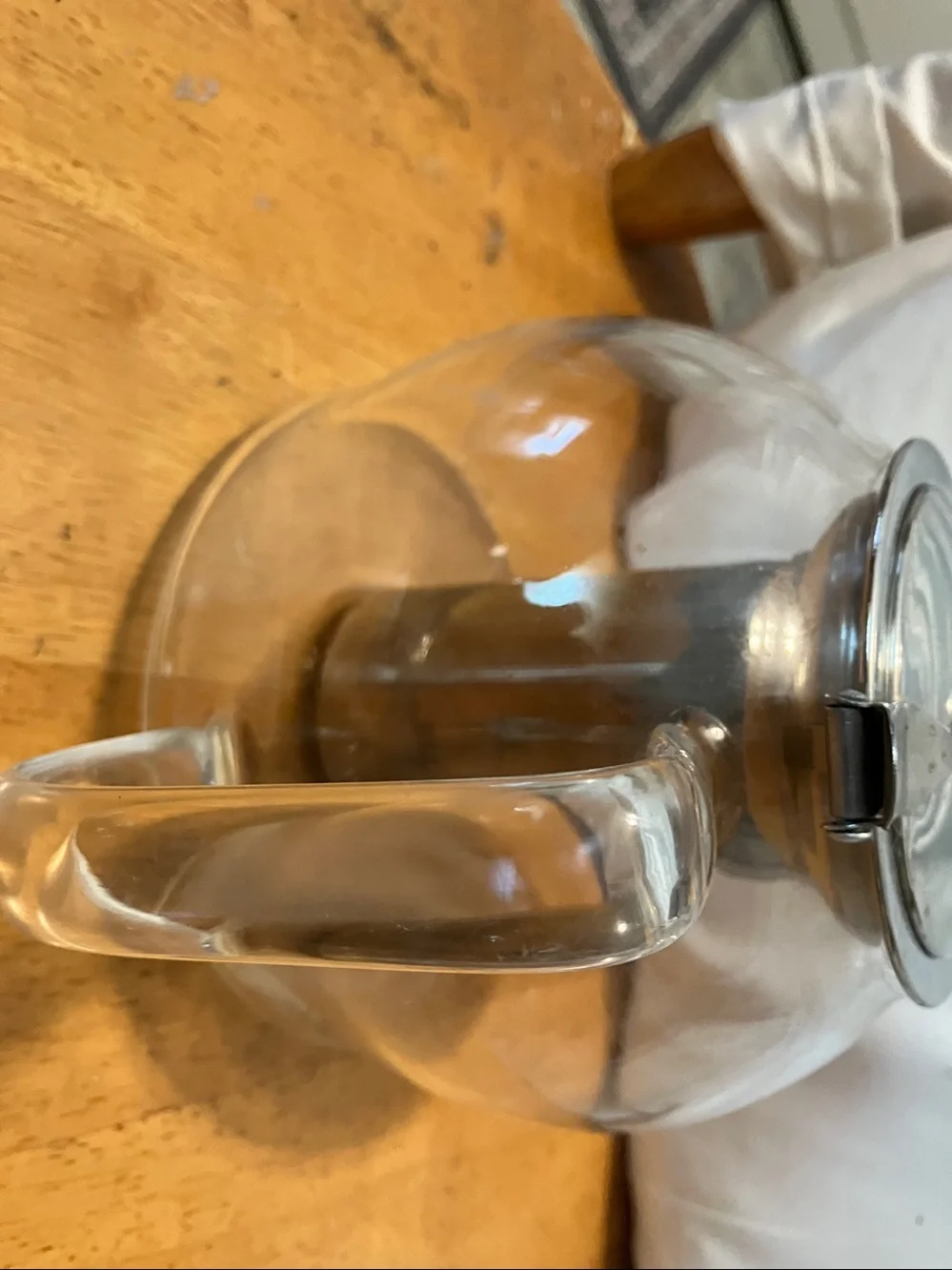 Like new. French press style glass tea pot with stainless steel pieces